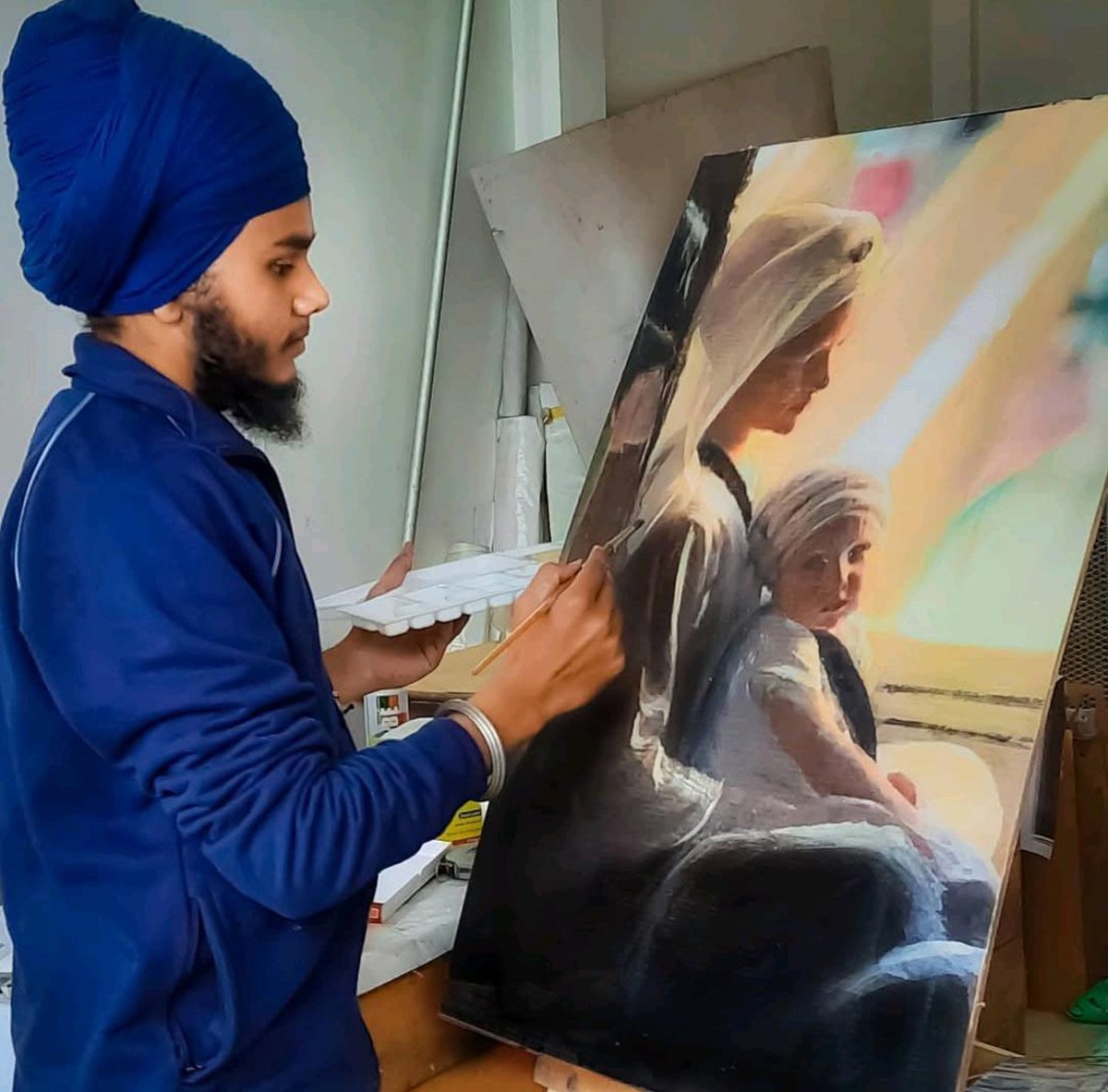 sikh-artist-Karman-painting-mother-child-portrait Thian tattoo artist