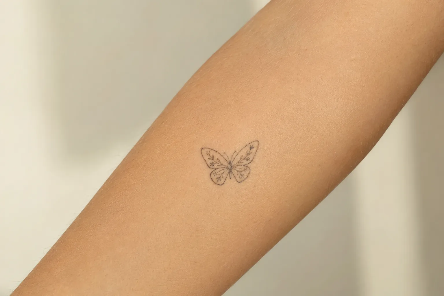 Fine Line Butterfly Tattoo